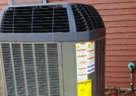 A heat pump outside a home. 